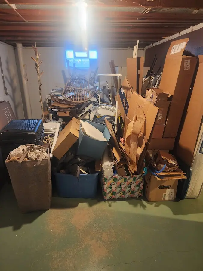 Roll-off dumpster container at job site for 6 Yard Dumpster Rental in Forest Oaks